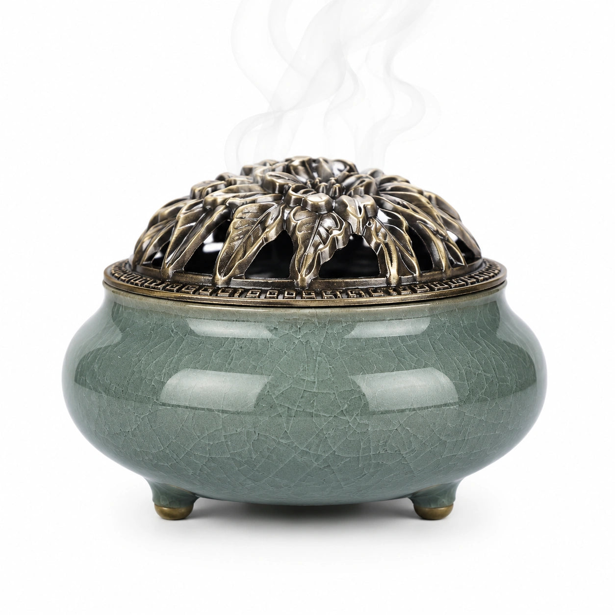Brûleur d'encens artisanal vert avec couvercle ajouré